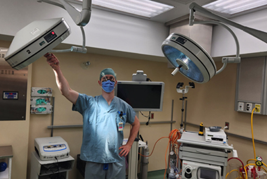 Photo of Operating Room lights with Dr. Daters